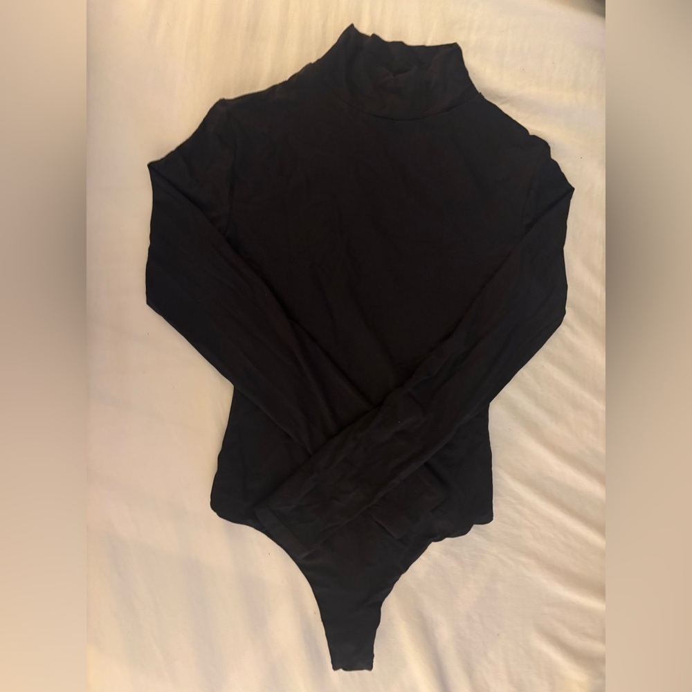 Black turtle neck long sleeve body suit
